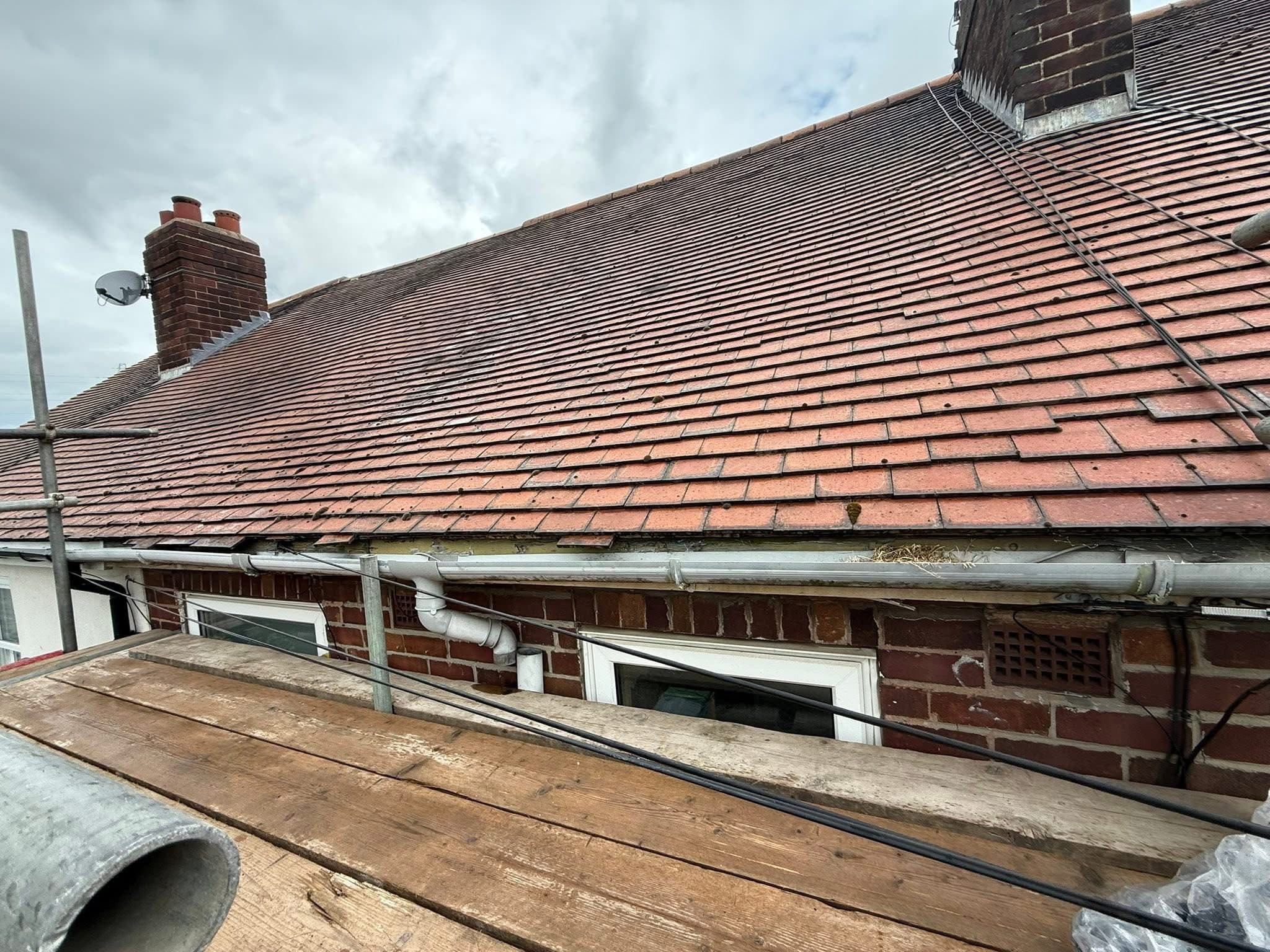 Black fascia, soffit and guttering, before